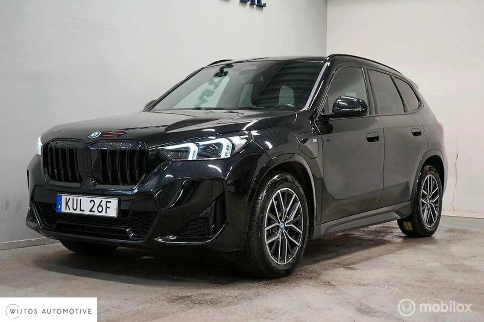BMW X1 xDrive25e 245pk M Sport, HK, leer, Shadow, trekhaa Zwart - 1
