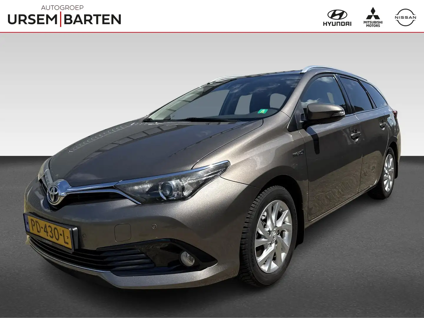 Toyota Auris Touring Sports 1.8 Hybrid Dynamic Grijs - 1