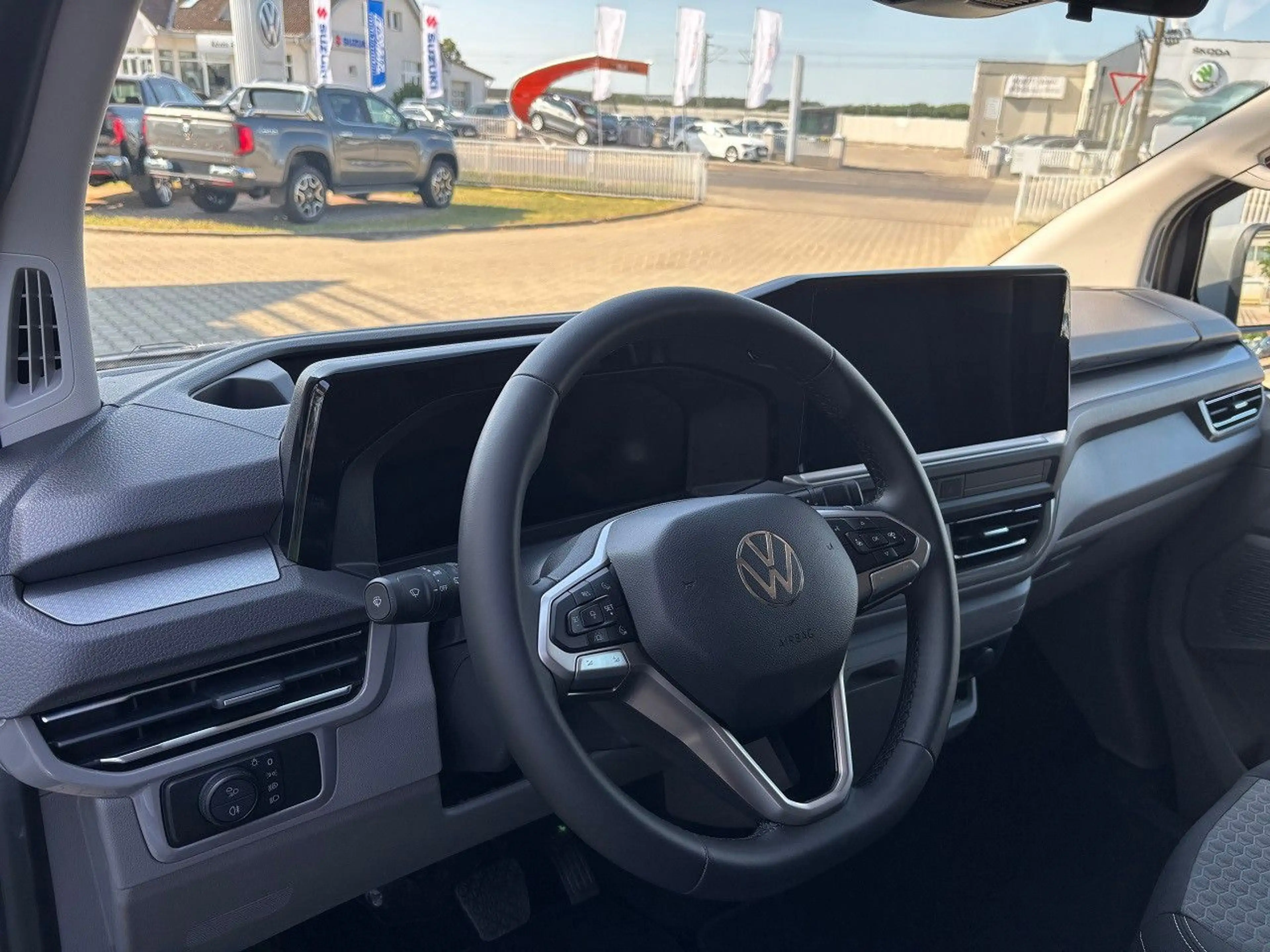 Volkswagen T7 Caravelle T7 LR Caravelle TDI DSG Style AHK ACC Side Navi — photo 13