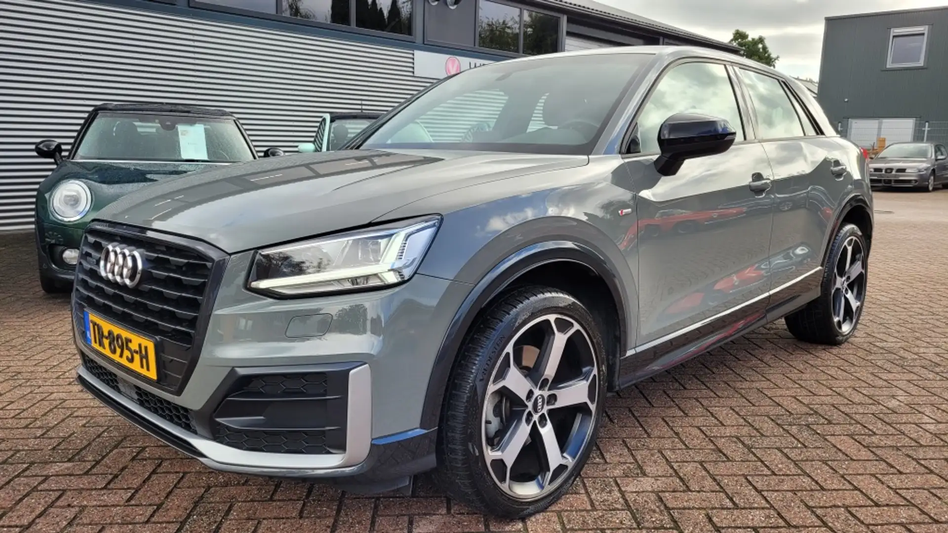 Audi Q2 1.4 TFSI CoD edition 1, S-line, navi, 1e eigenaar. Grijs - 1