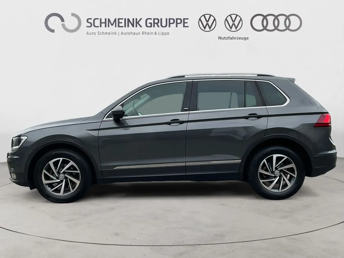 Volkswagen Tiguan 1.4 TSI Sound Allwetter PDC Navi Grijs - 2