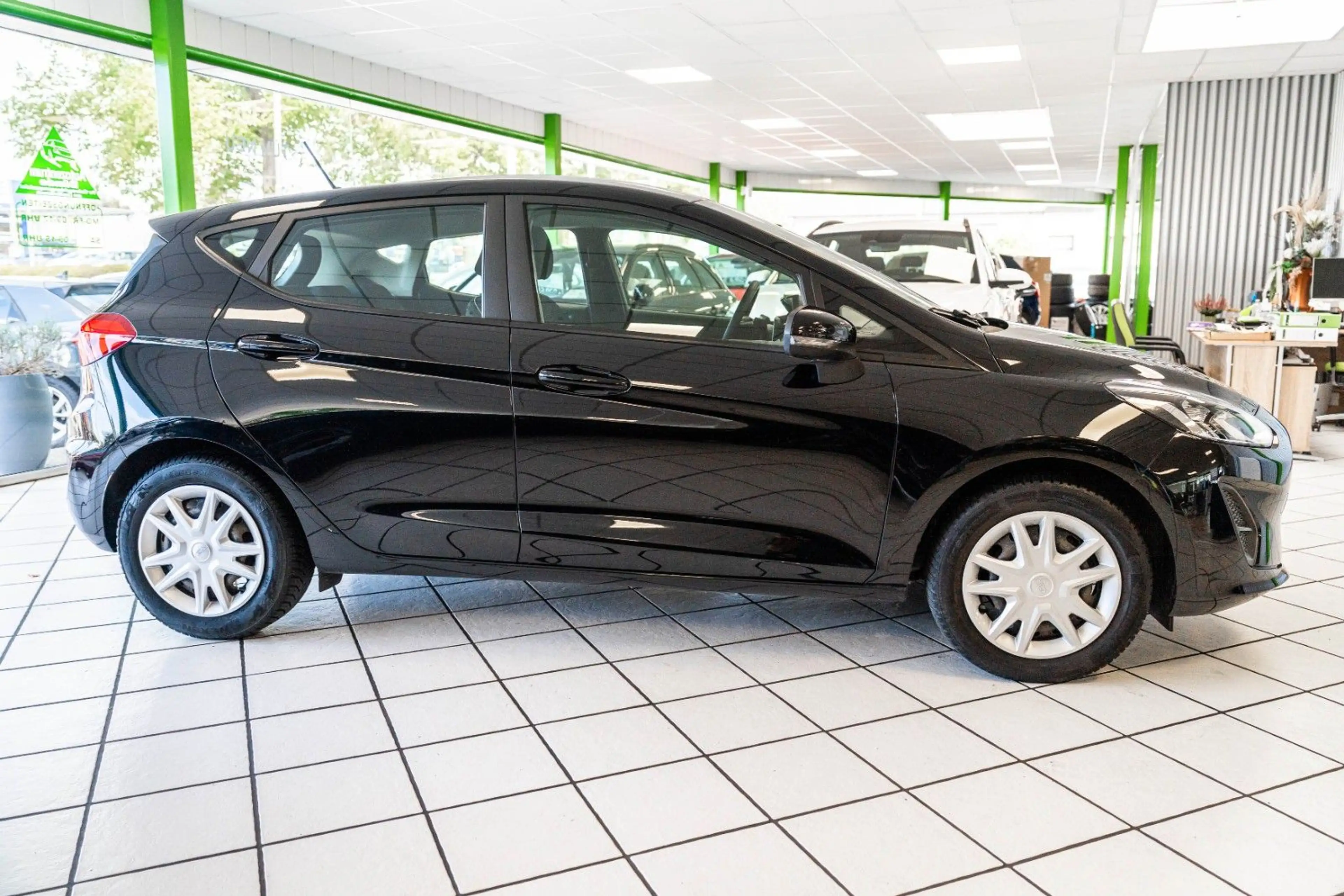 Ford Fiesta 1.1 Benzin 71 PS 1.Hand Klima Sitzheizung — photo 9