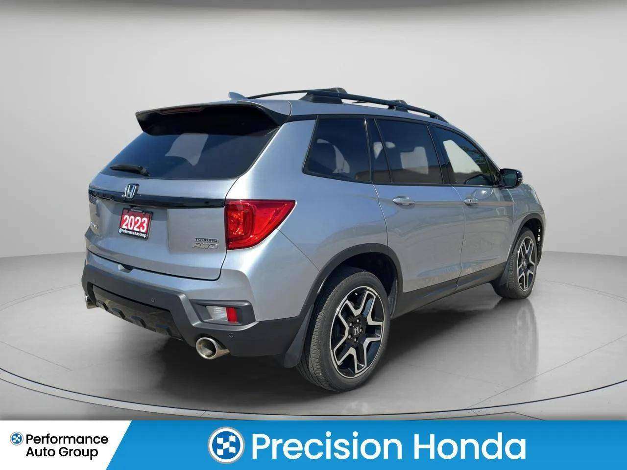 2023 Honda Passport Touring — снимка 1