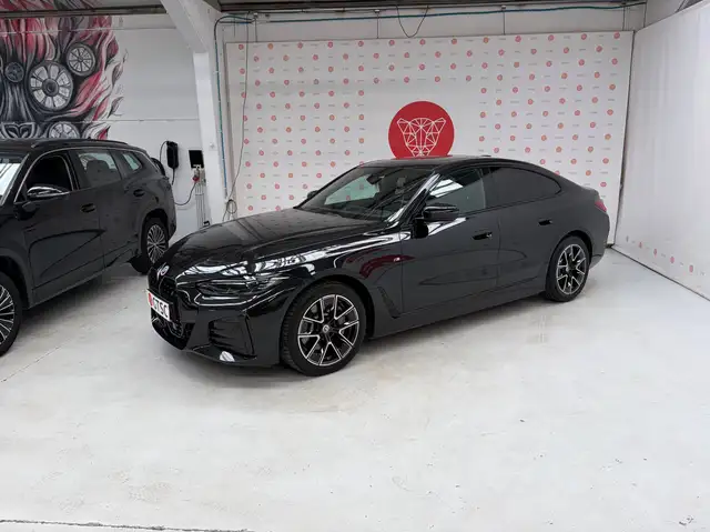 BMW i4 Gran Coupe 83.9 kWh eDrive40 Pano dak M pakket Volleder Carplay Gloss pakket Camera Head up Active guard
