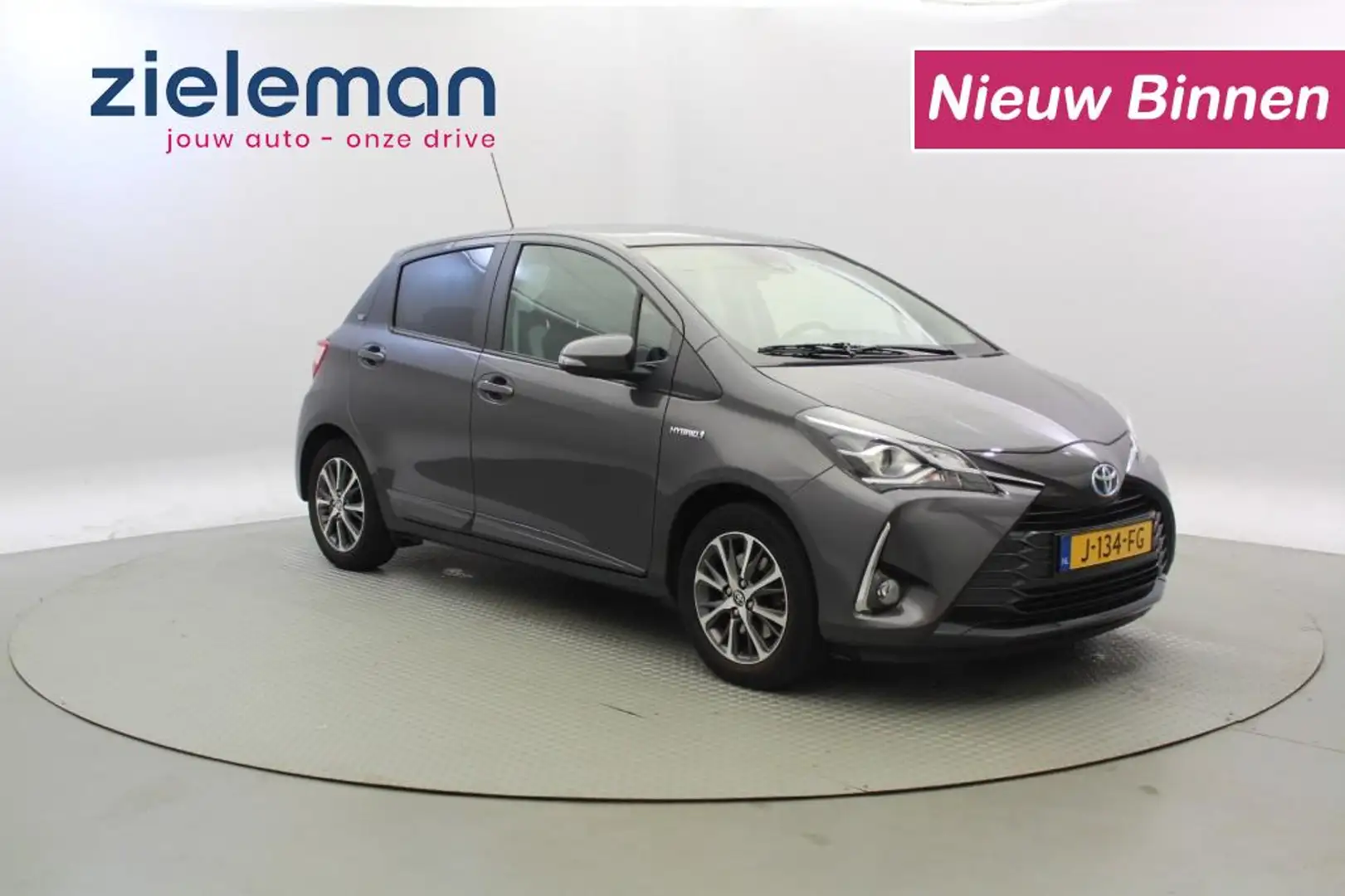 Toyota Yaris 1.5 Hybrid Y20 Exclusive Edition - Navi, Camera, C Grijs - 1