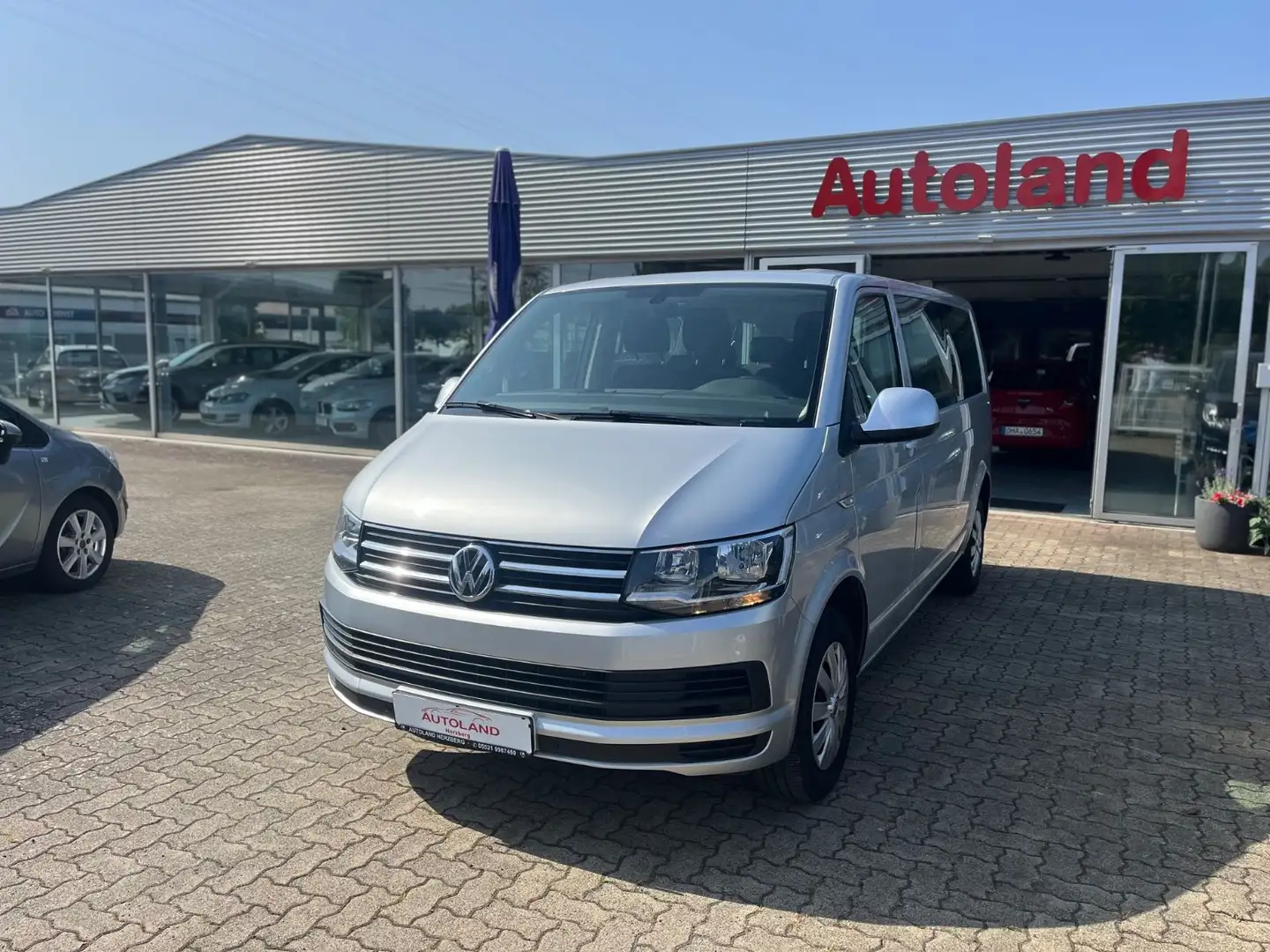 Volkswagen T6 Caravelle lang 1 HD STHZ NAVI SHZ KAMERA AHK Silber - 1