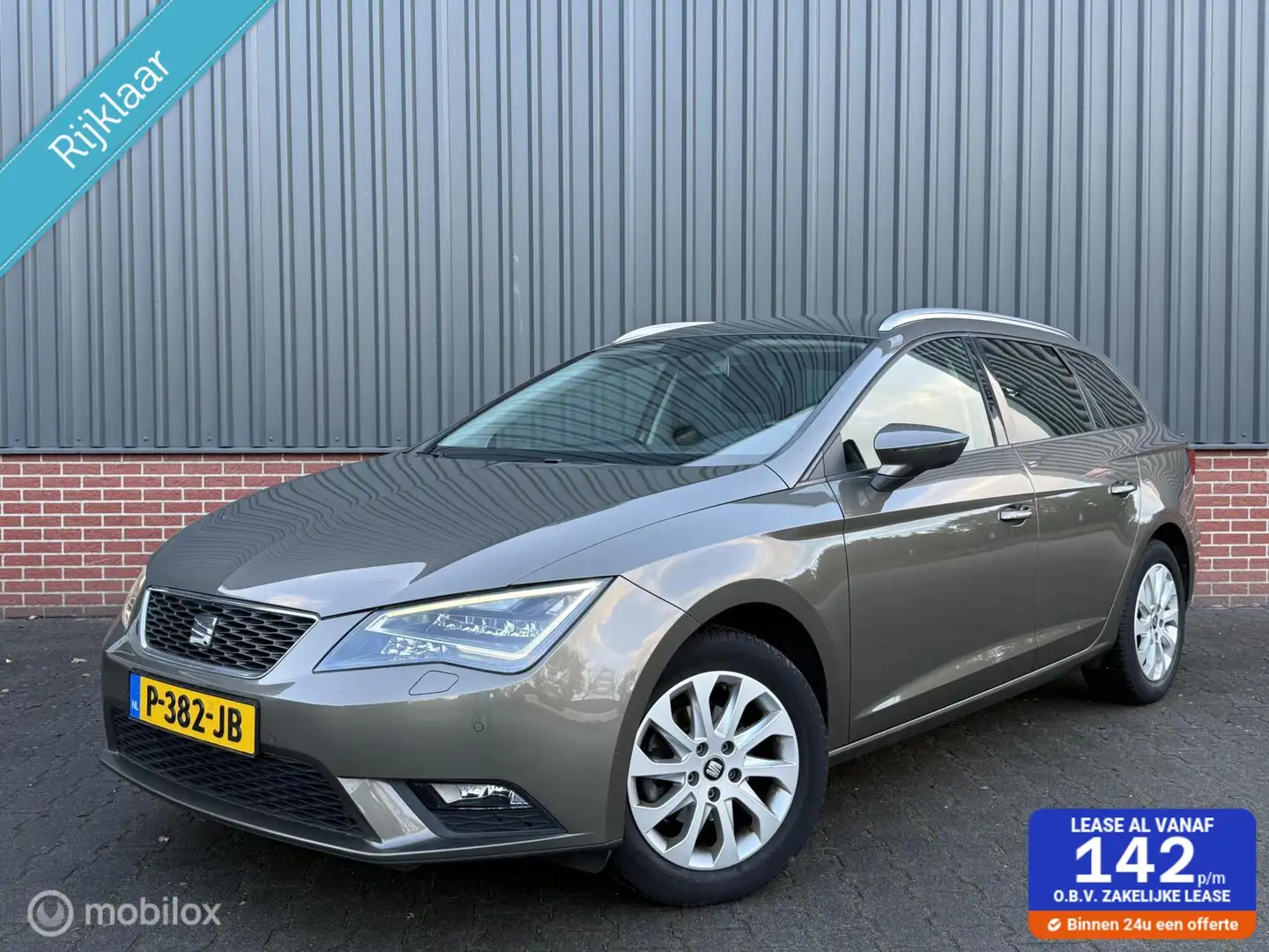 SEAT Leon ST 1.2 TSI Style Business Airco Cruise Led Nieuwe Groen - 1