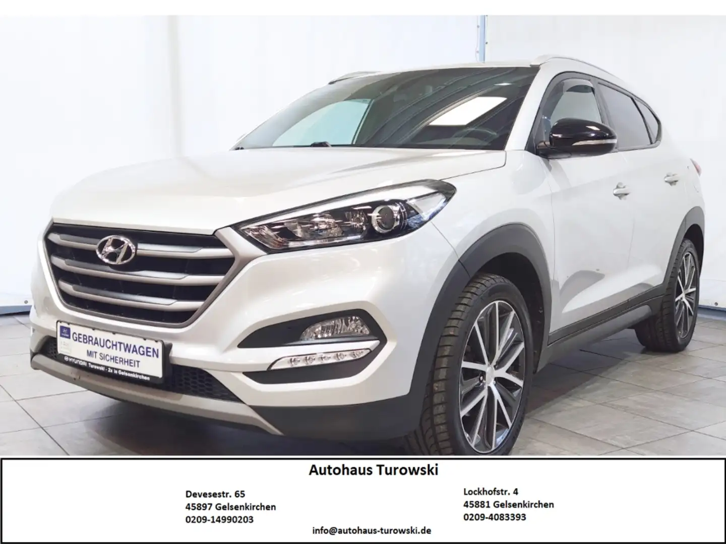 Hyundai TUCSON Passion 2WD Autom. Navi Kamera PDC SHZ Silber - 1