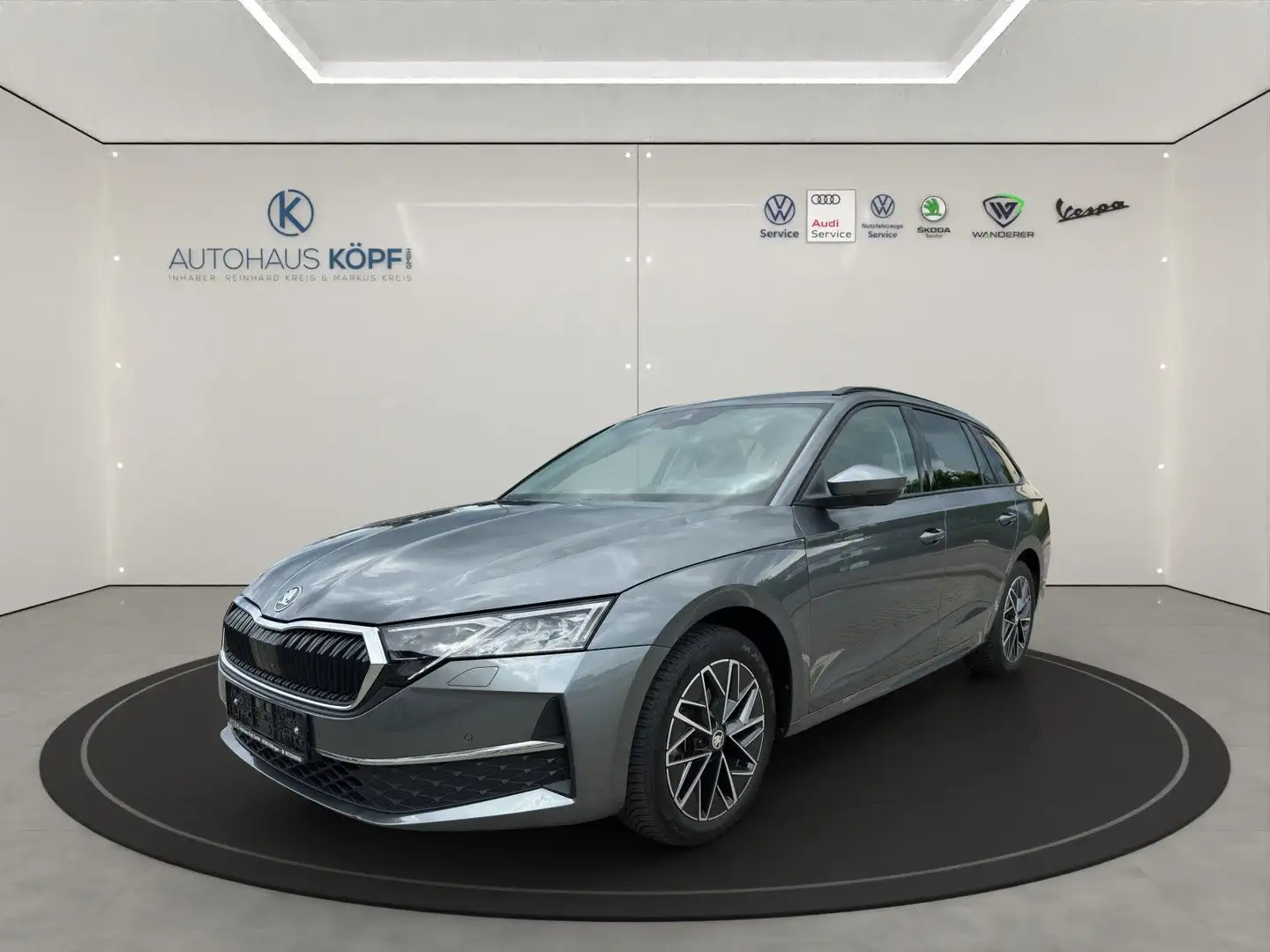 Skoda Octavia Combi 2.0 TDI_DSG_Selection_Pano_AHK_Head Up Grau - 1