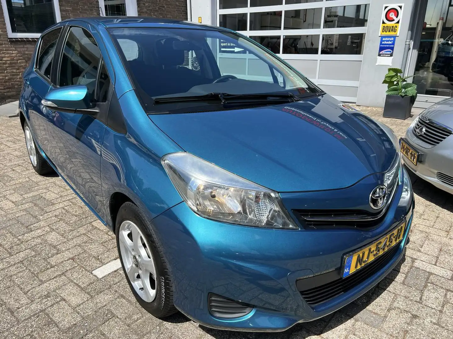 Toyota Yaris 1.3 16v VVT-i Aspiration 5-drs A/T + BOVAG Blauw - 2