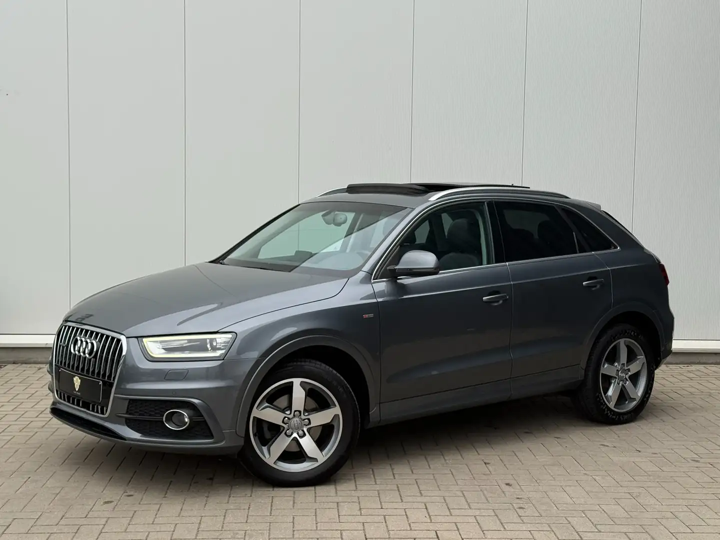 Audi Q3 ✅2.0 TFSI quattro S tronic S-Line GARANTIE Pano Grijs - 1