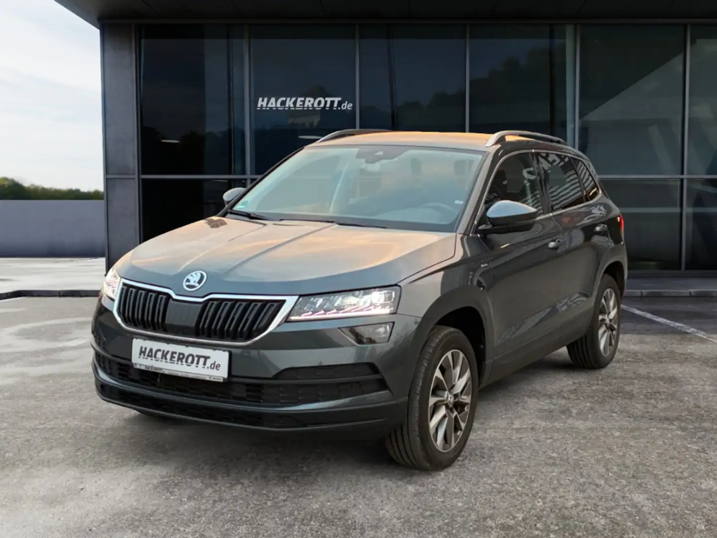 Skoda Karoq Clever 1.5 TSI DSG AHK PDC v+h Navi Rückfahrk. Grau - 1