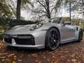 Porsche 992 Cabrio 3.8 Turbo S, Lift, Org. NL, Akrapovic Grijs - thumbnail 1