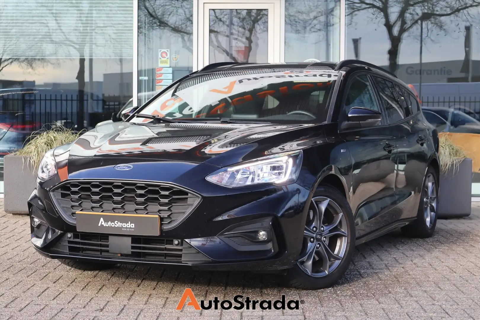 Ford Focus Wagon 1.0 ST-Line 125pk | Cruise | Climate | Winte Noir - 1