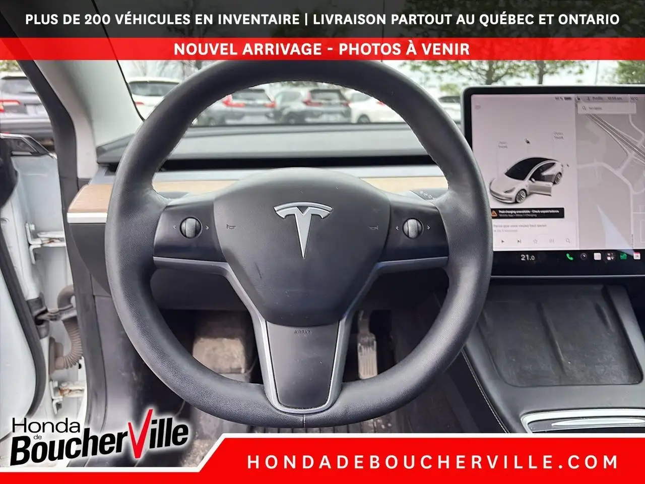 Tesla Model 3 photo Tesla Model 3