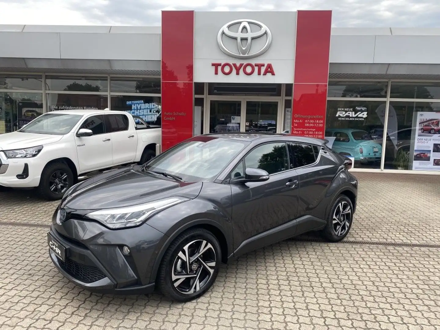 Toyota C-HR 2.0 Hybrid AT Team D + Licht-P. + Navi + Bi-Tone Gris - 1