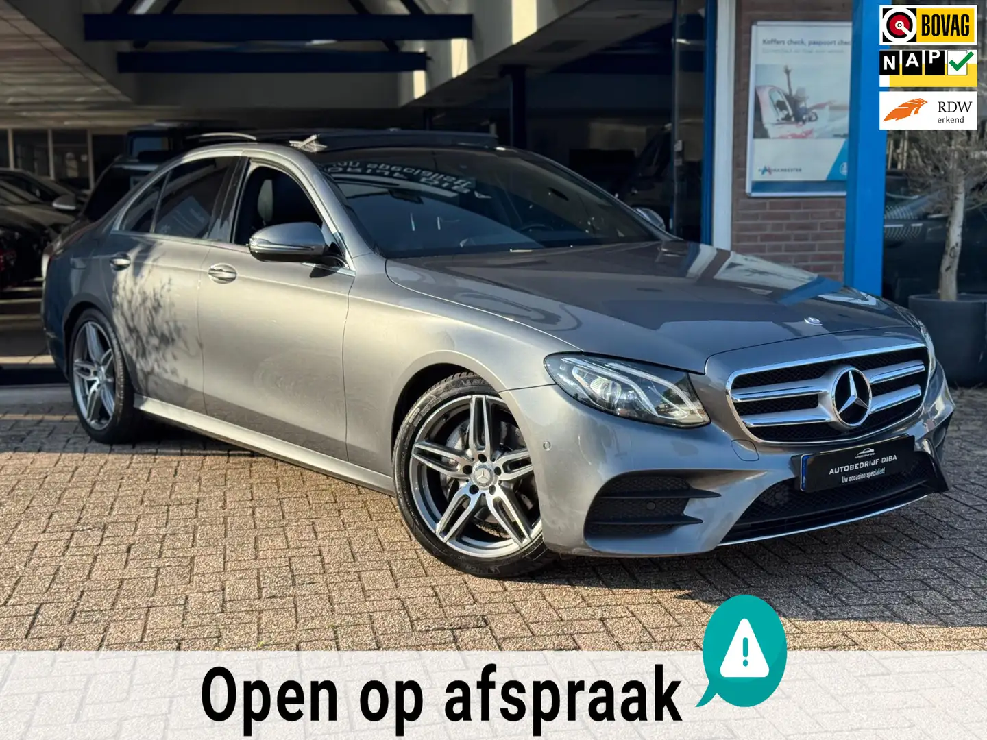 Mercedes-Benz E 200 AMG-Line 2016 AUT PANO CAMERA NAP Grijs - 1