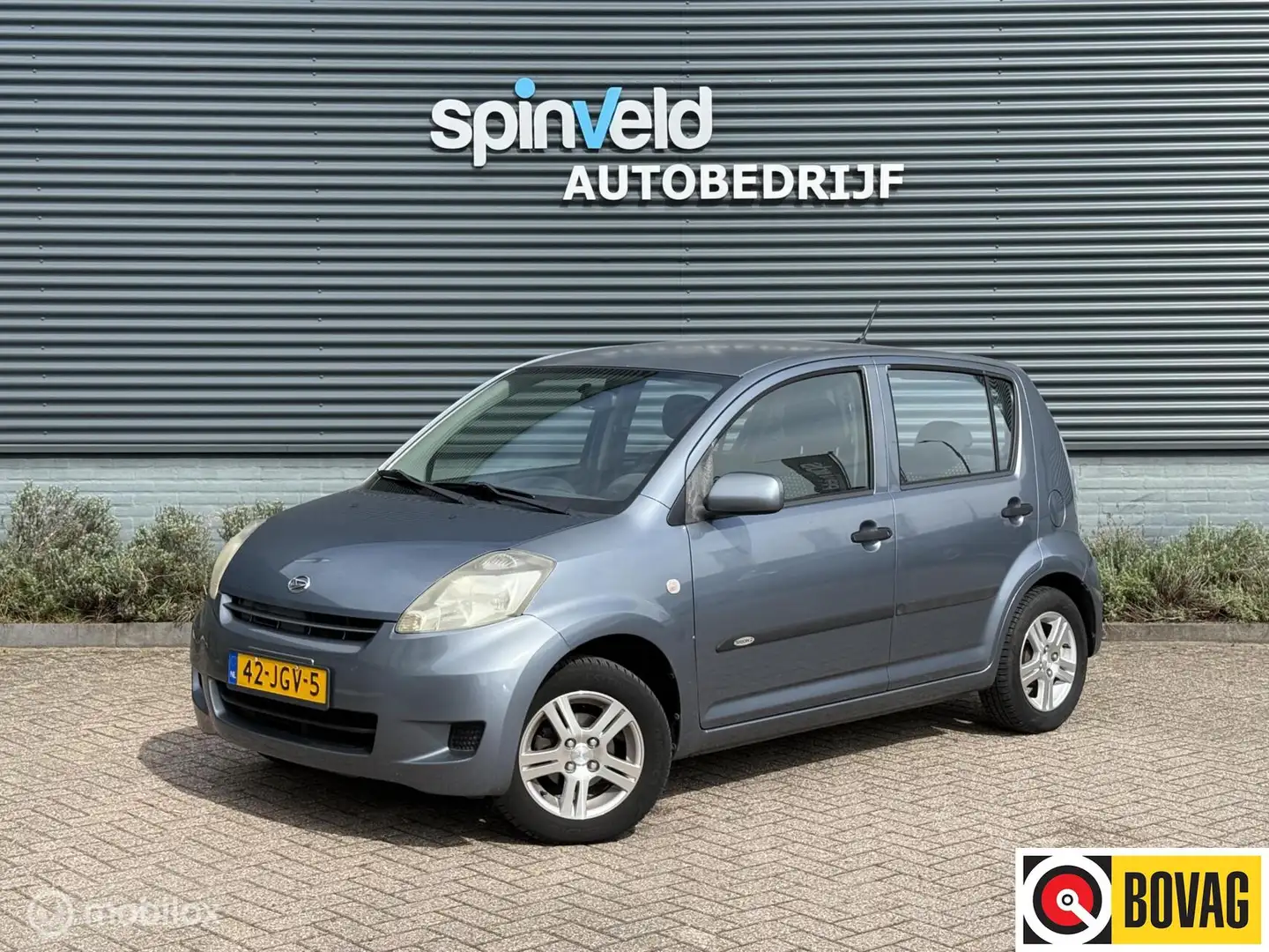 Daihatsu Sirion 2 1.0-12V Premium - Elek pakket - Nap - Grau - 1