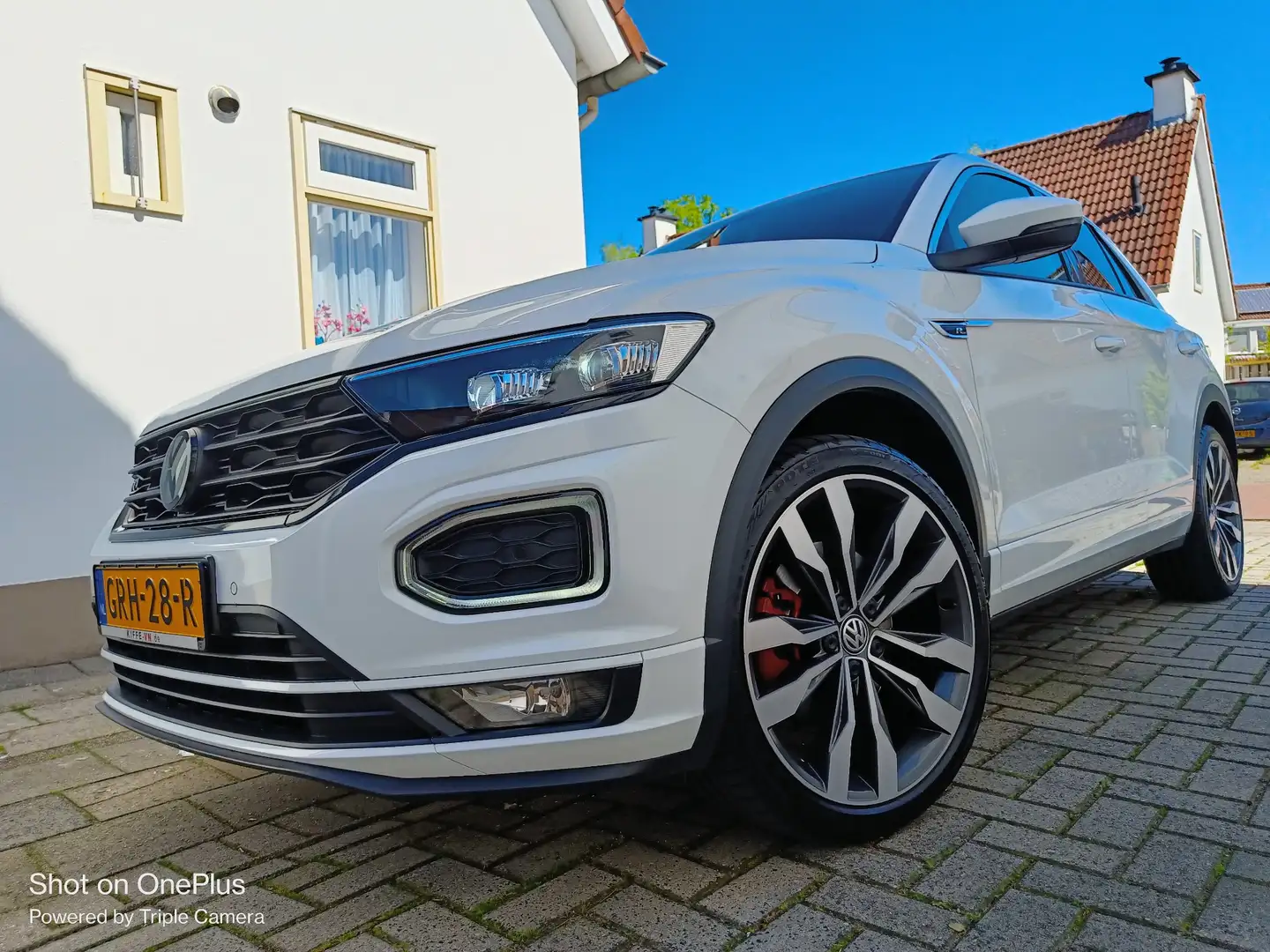Volkswagen T-Roc 2.0 TSI 4Motion. Sport 3x R-Line Wit - 1