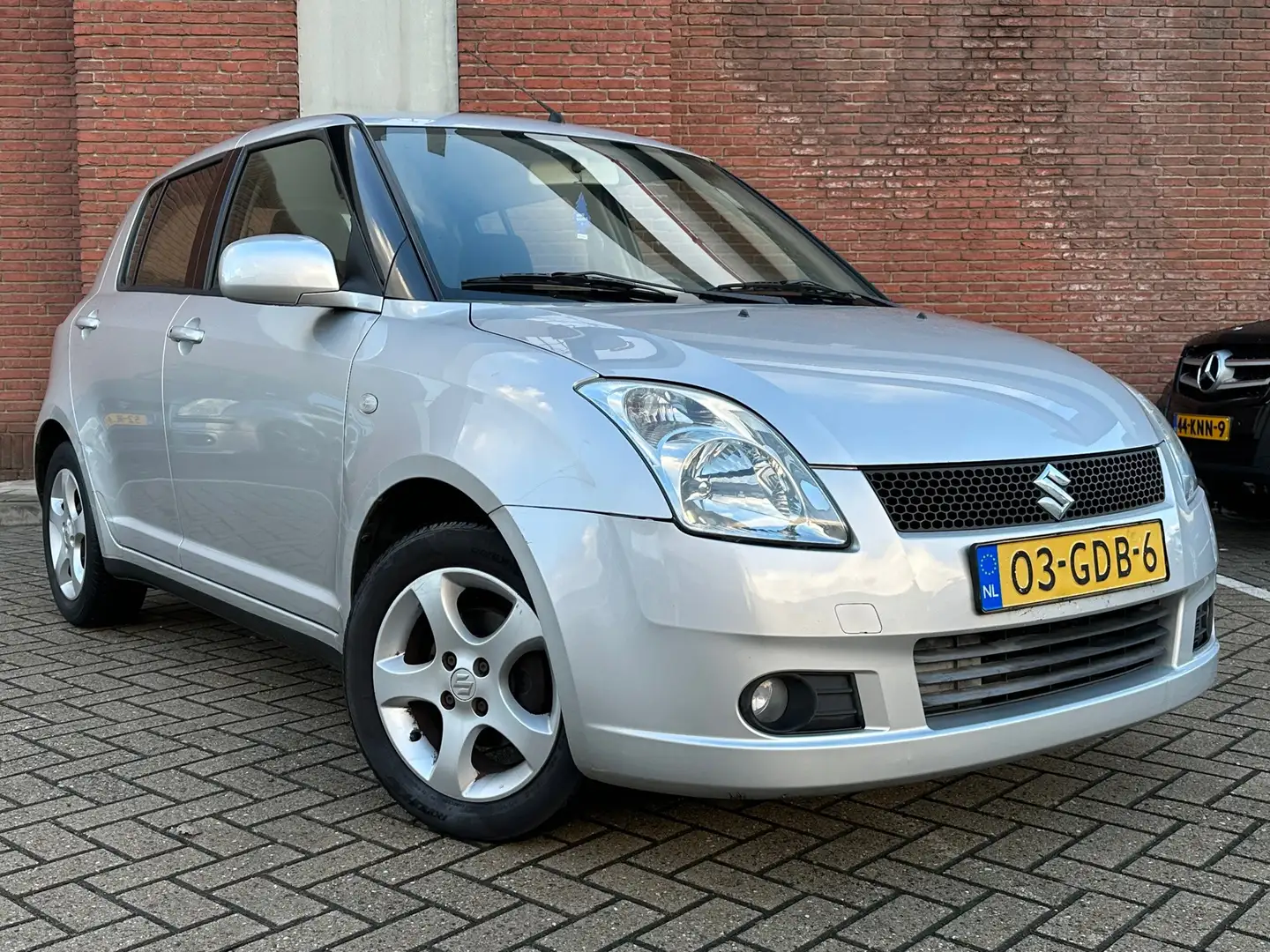 Suzuki Swift 1.5 Exclusive|AIRCO| KEYLESS| NAP Grijs - 1