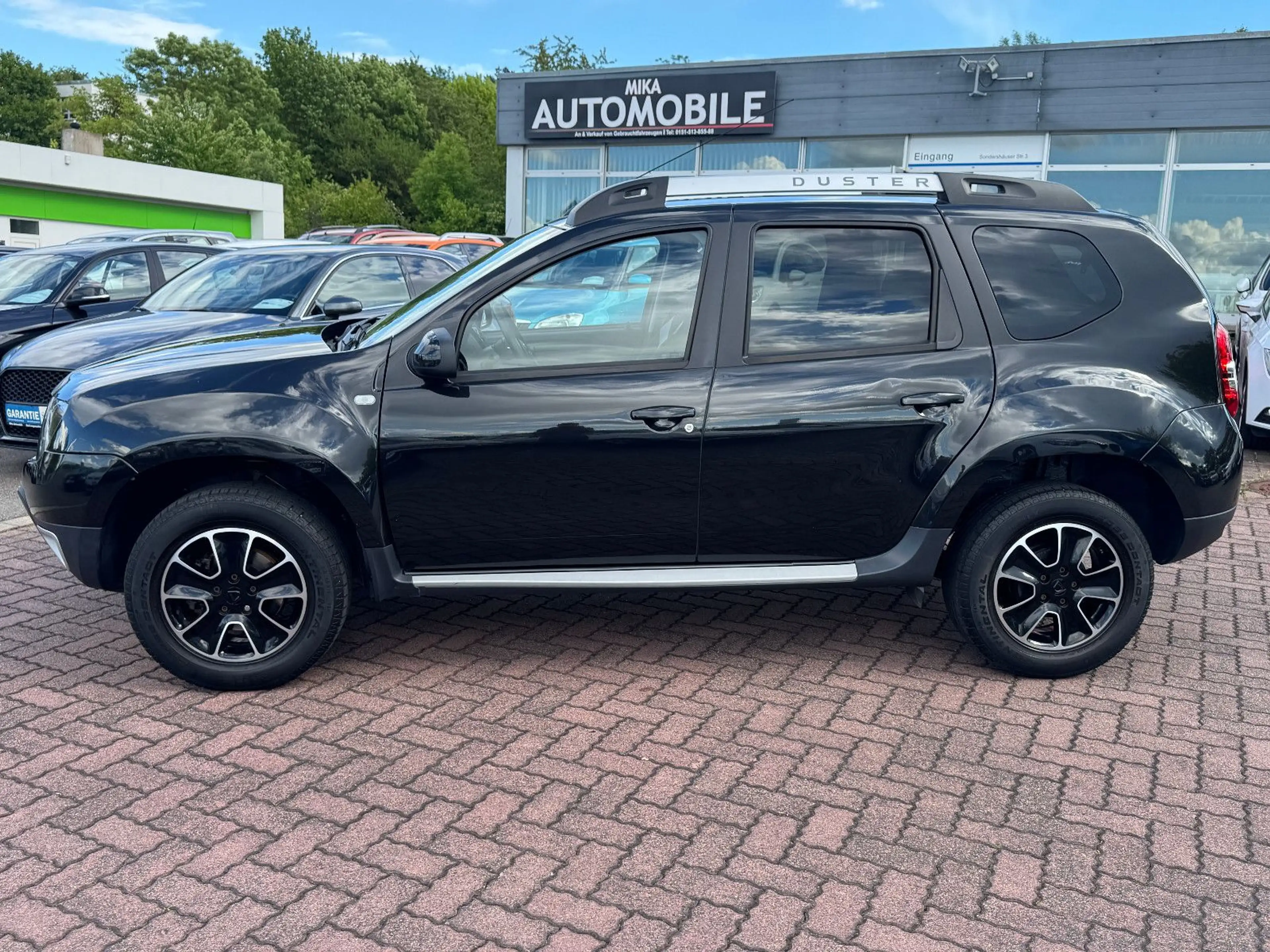 Dacia Duster Black 4x2  Navi Shz Pdc Tempo TÜV/HU/NEU — photo 7