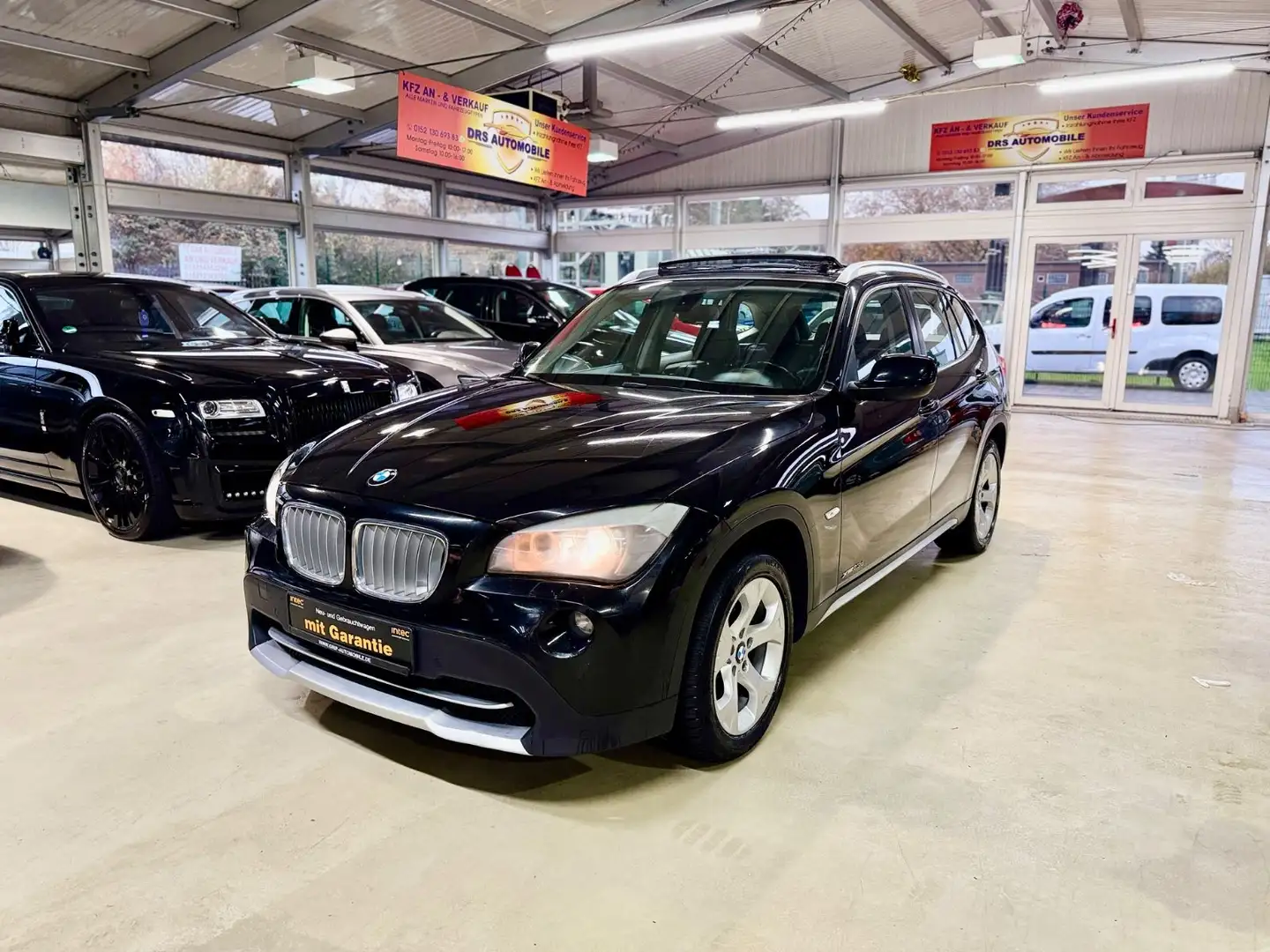 BMW X1 23 d xDrive Pano AHK Voll Noir - 1