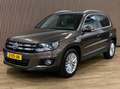 Volkswagen Tiguan 1.4 TSI Sport&Style|115000KM|Navigatie|Climate Con Braun - thumbnail 1