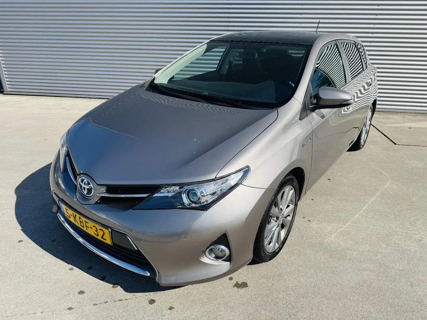 Toyota Auris 1.8 Hybrid Lease Panoramadak | Trekhaak | Navi | C Bruin - 2