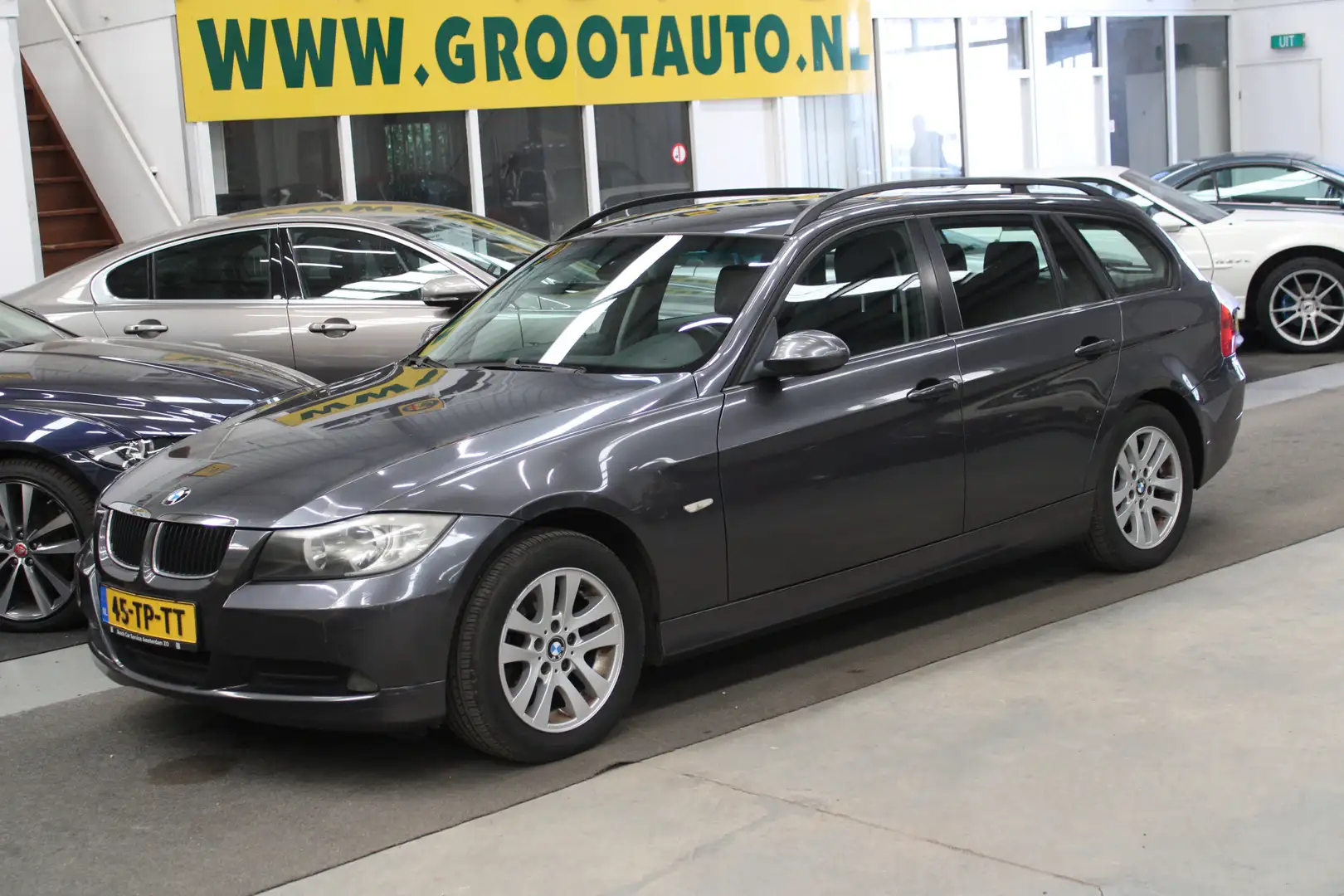 BMW 318 3-serie Touring 318i High Executive Airco, Cruise Grijs - 1