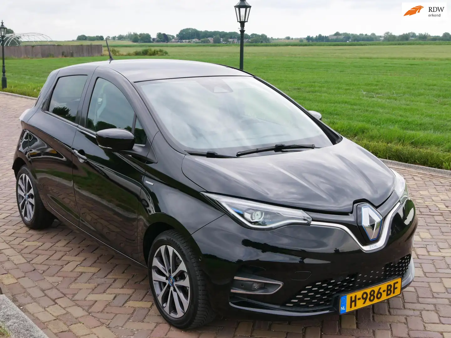 Renault ZOE R135 Edition One 52 kWh ** 9499 NETTO ** Zwart - 1