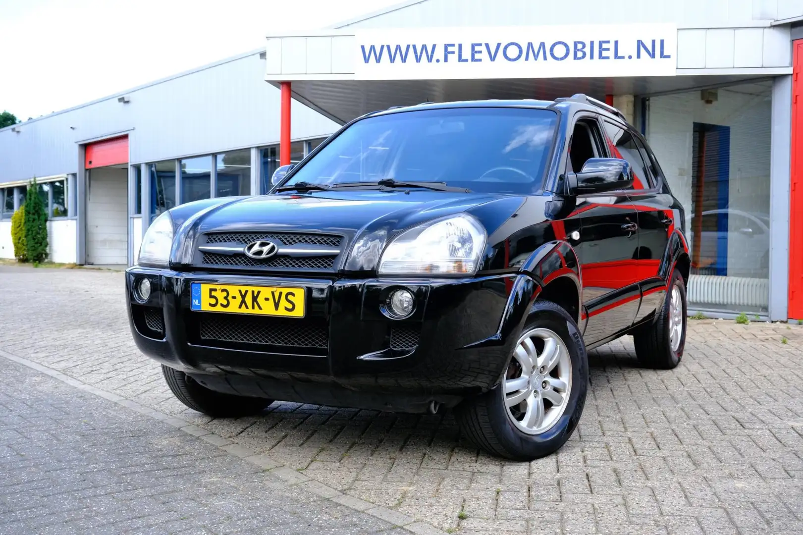 Hyundai TUCSON 2.0i 141pk Style Premium Leder|Clima|LMV Zwart - 1