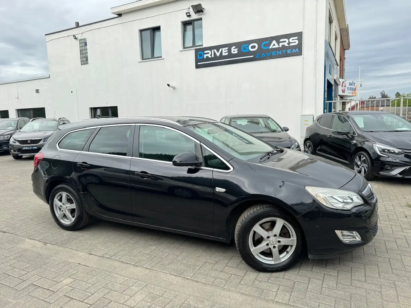 Opel Astra Astra 1.7 CDTI DPF Sports Tourer Sport - Navigatie Zwart - 1
