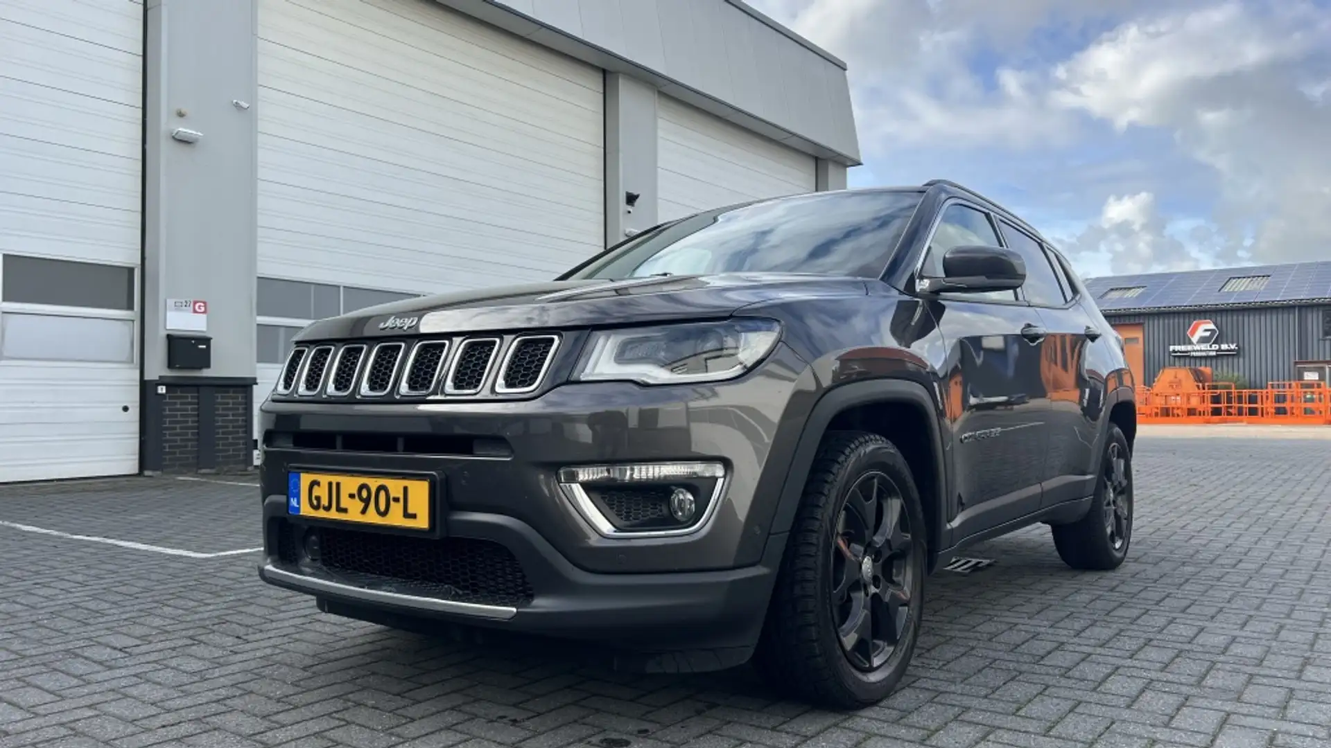 Jeep Compass 1.4 M.Air Limited Grijs - 1