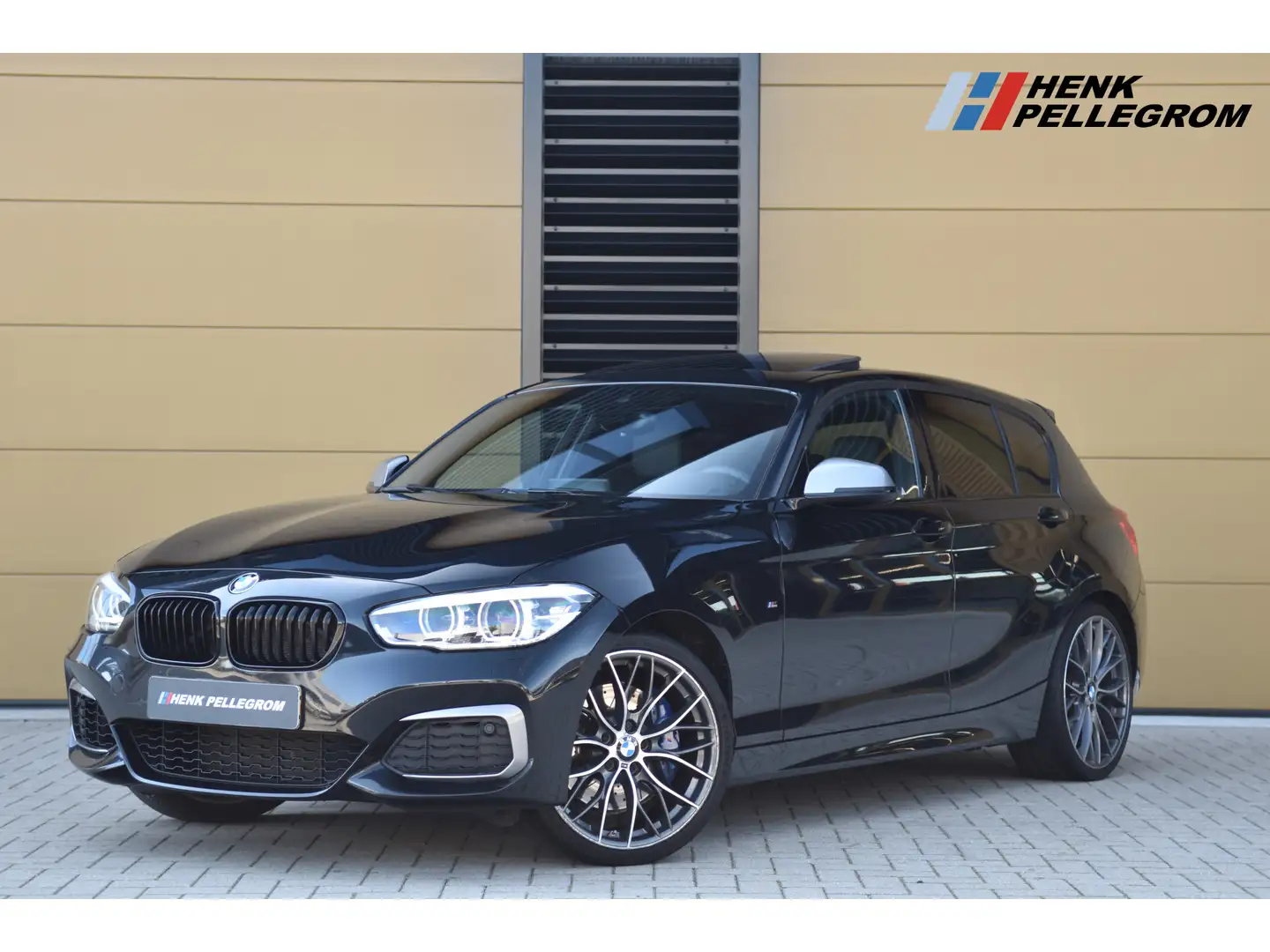 BMW 140 1-serie M140i xDrive High Executive * Schuifdak * Schwarz - 1