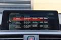 BMW 140 1-serie M140i xDrive High Executive * Schuifdak * Schwarz - thumbnail 18