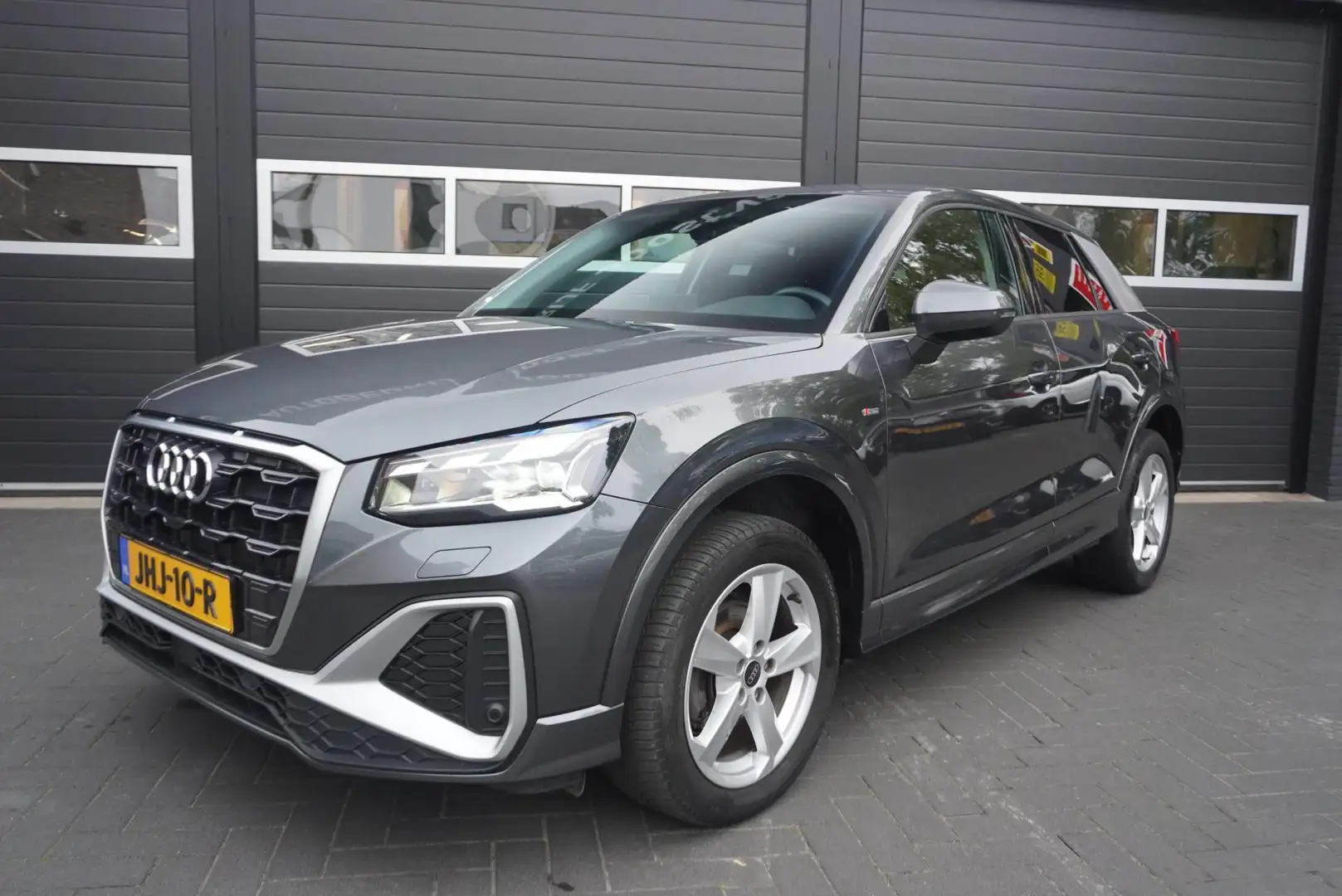 Audi Q2 35 TFSI S Edition Airco/Cruise/Camera/Park.sensore Grijs - 1