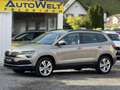 Skoda Karoq Style 4x4 ALLRAD AUTOMATIK *NAVI*AHK *STANDHEIZUNG Beige - thumbnail 1