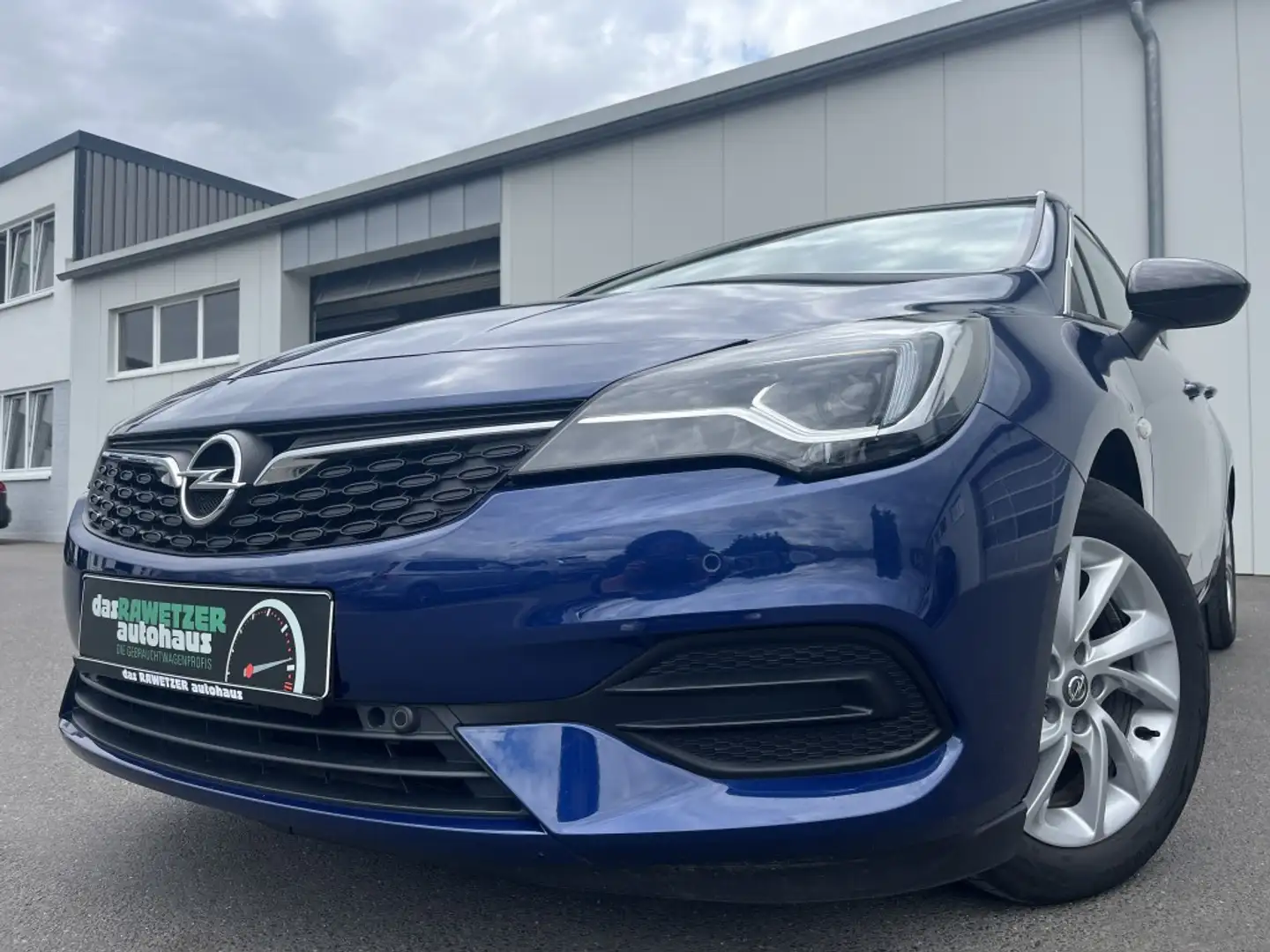 Opel Astra K ST 1.2 Elegance 100€ m. 20% Anzahlung Digital Blau - 1