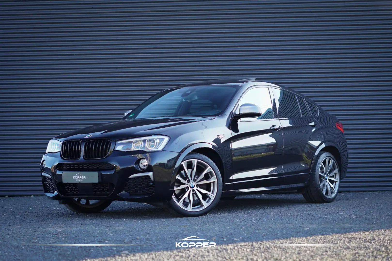 BMW X4 M40i High Executive / Schuifdak / Carplay / Trekha Zwart - 1