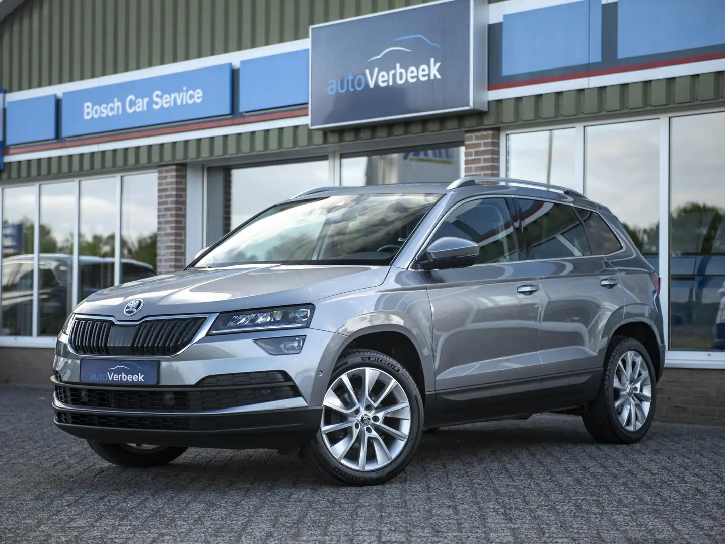 Skoda Karoq 1.5TSi ACT 150pk DSG Style Business | Leer | Navi Grijs - 1