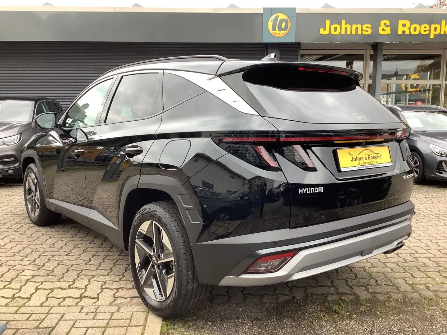 Hyundai TUCSON 1,6 Automatik / NAVI / SITZ+LENKRAD-HZG Schwarz - 2