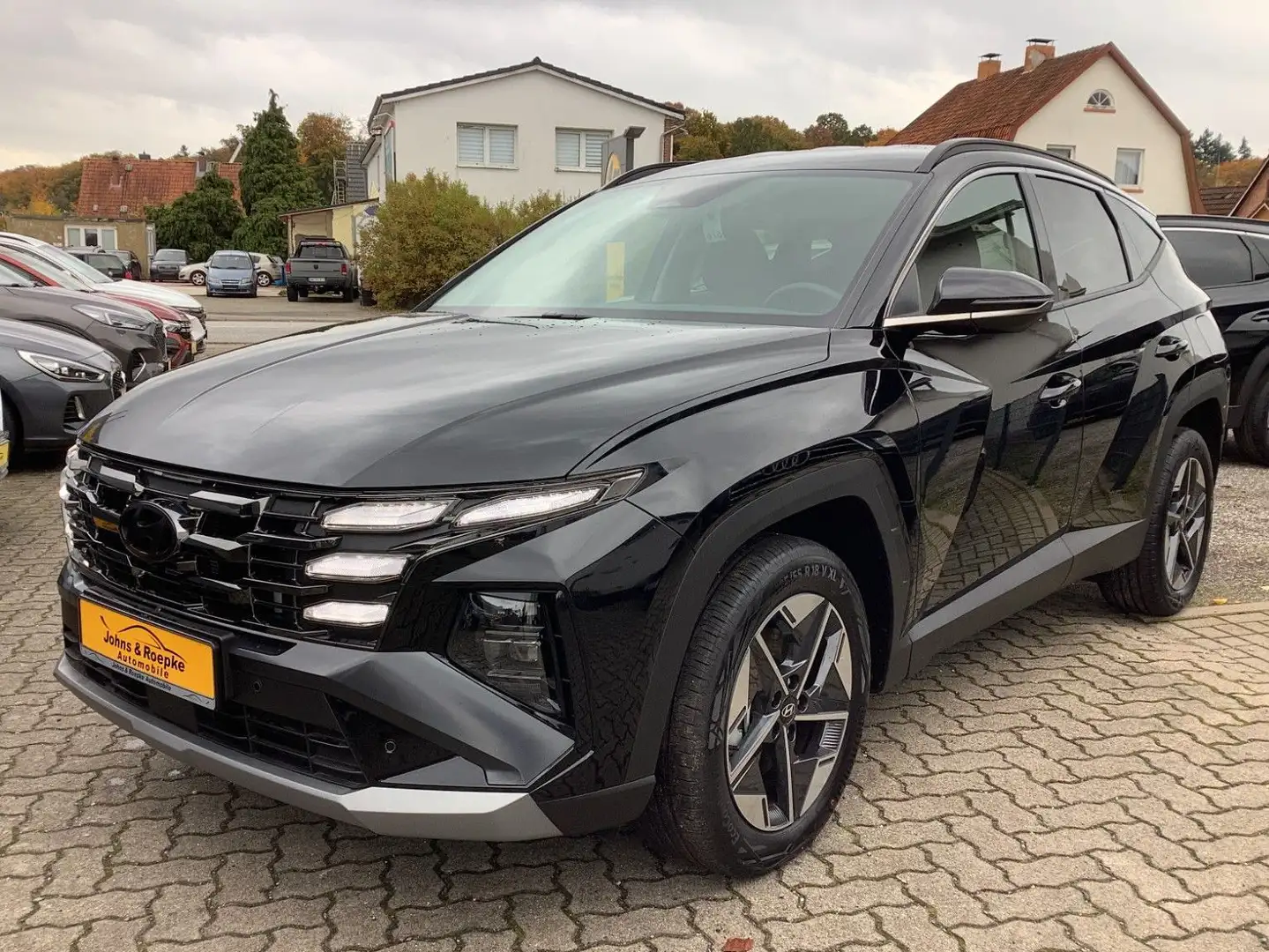 Hyundai TUCSON 1,6 Automatik / NAVI / SITZ+LENKRAD-HZG Schwarz - 1