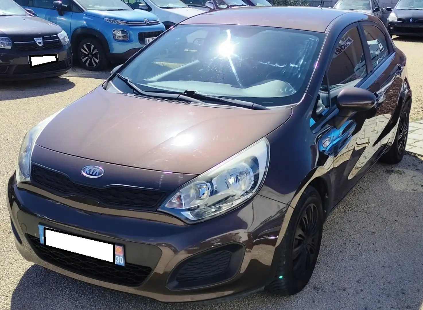 Kia Rio 1.2L 85 ISG Motion Bronze - 1