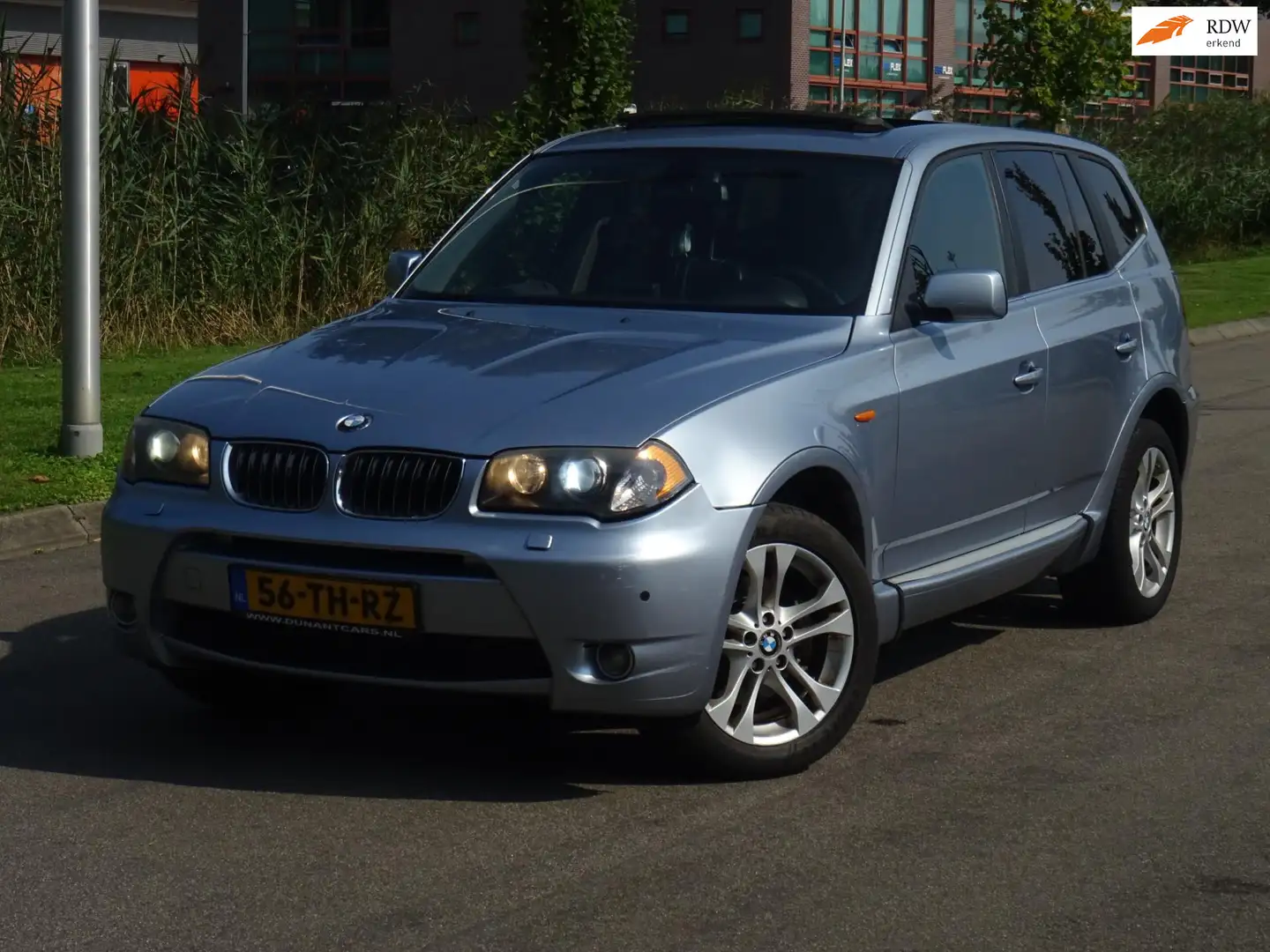 BMW X3 3.0i High Executive AUT. PANORAMADAK/LEER/NAVI/XEN Blauw - 1