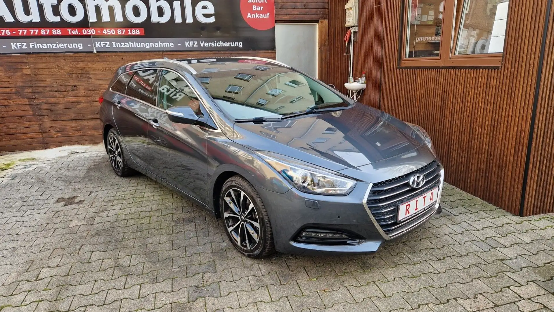 Hyundai i40 cw Style Automatik, SHZ, Kamera, PDC Grau - 1