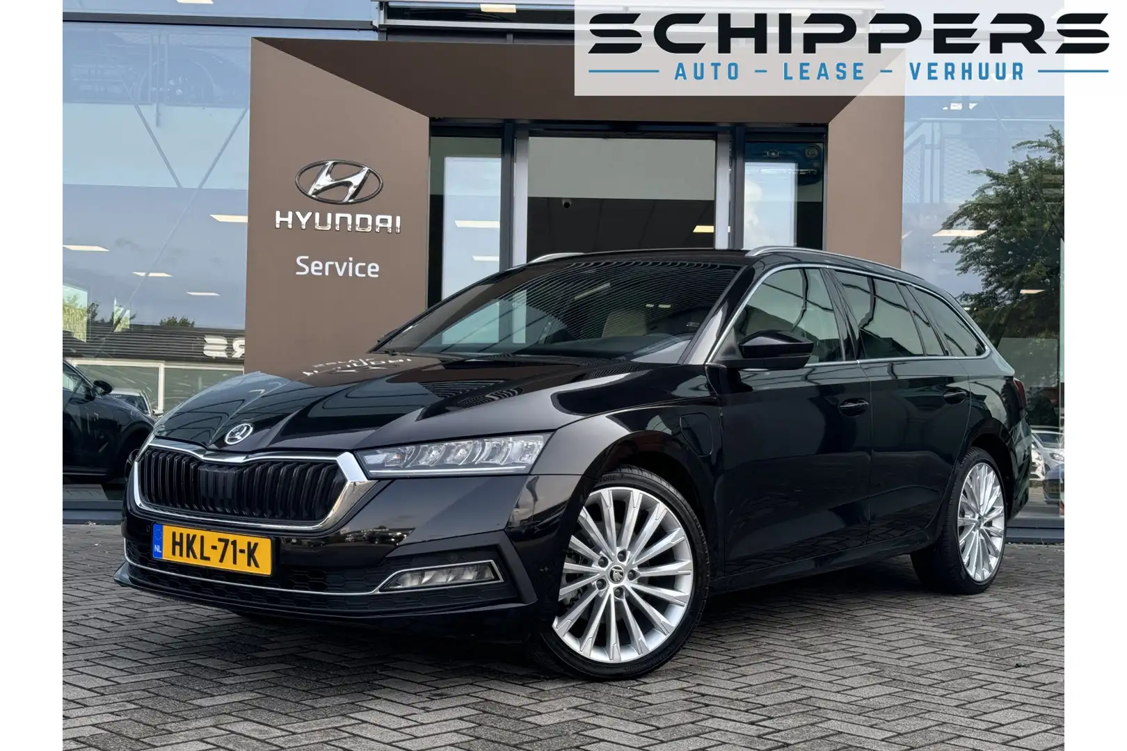 Skoda Octavia Combi 1.4 TSI iV PHEV First Edition | 19" velgen | Zwart - 1