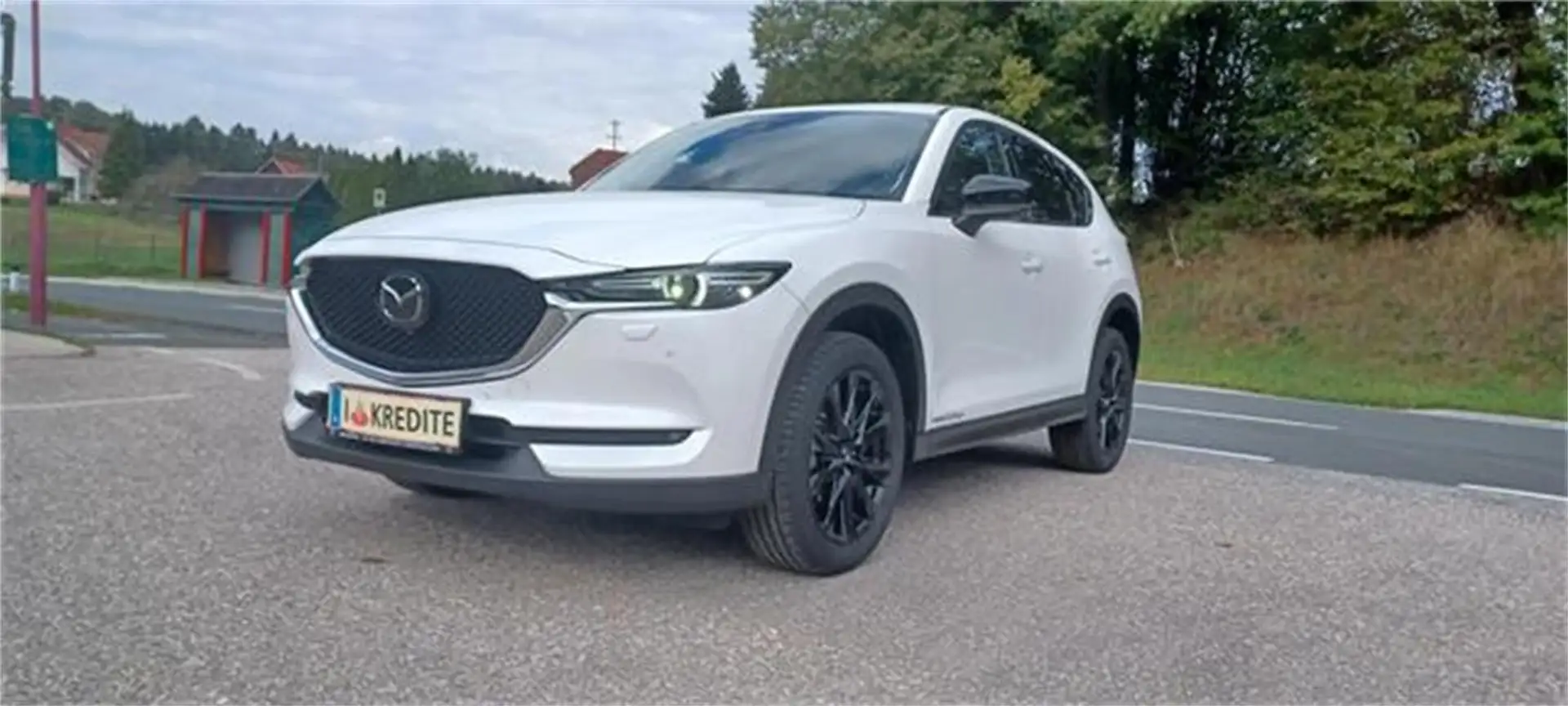 Mazda CX-5 G165 AWD Homura Blanc - 1