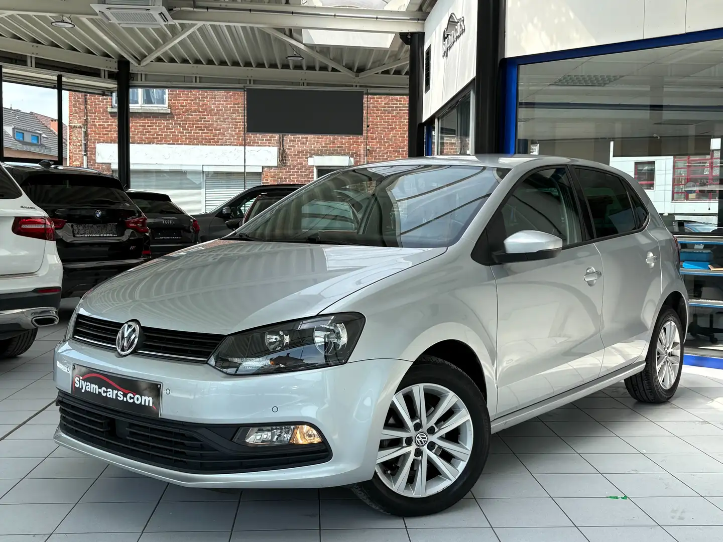 Volkswagen Polo 1.2 TSI ** CLIM * PDC * JANTES * CARNET ** Grijs - 1