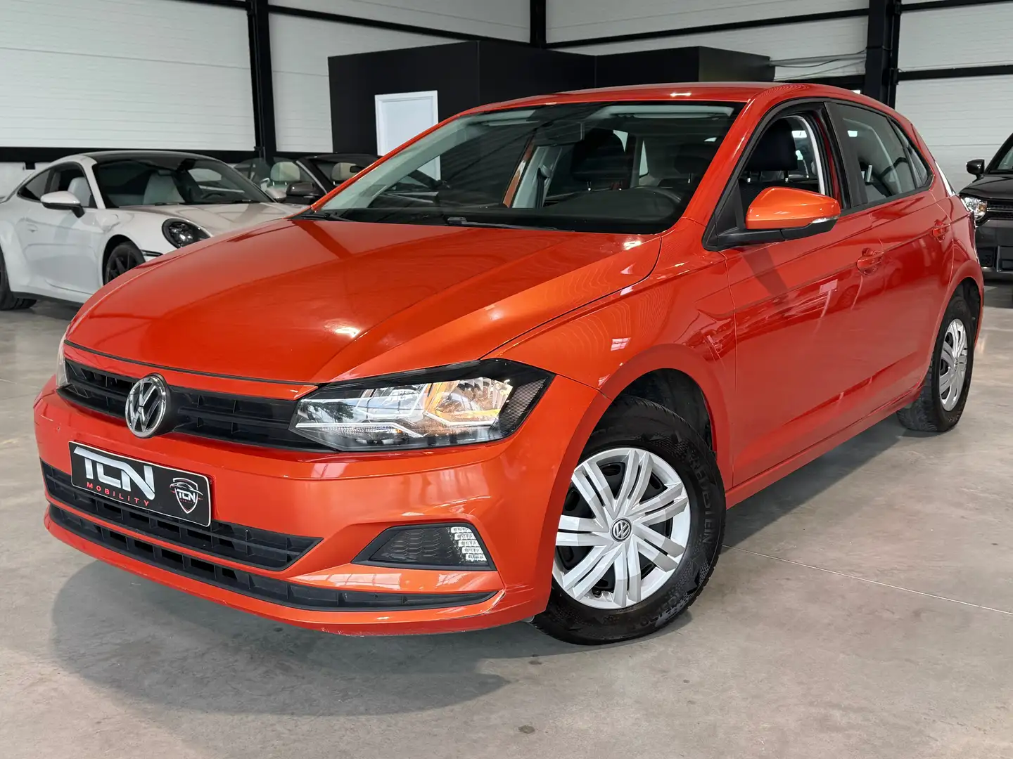Volkswagen Polo ✅ Polo 1.0i High-Line - air co - Bluetooth ✅ Orange - 1