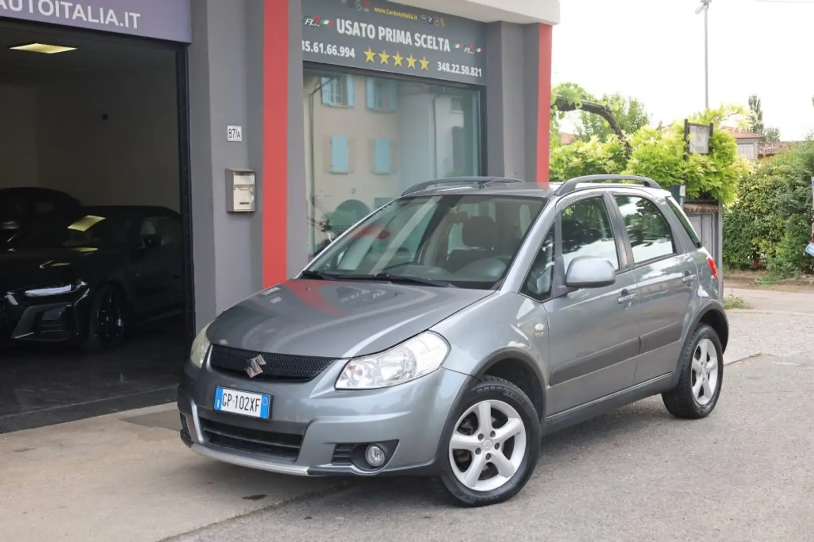 Suzuki SX4 1.9 DDiS 4WD Outdoor Line 4x4 Clima Radio CD/Mp3 Gris - 1